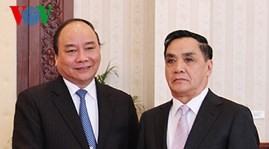 Deputy PM Nguyen Xuan Phuc visits Laos - ảnh 1